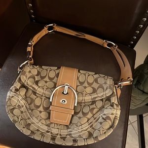 Worn coach shoulder bag.